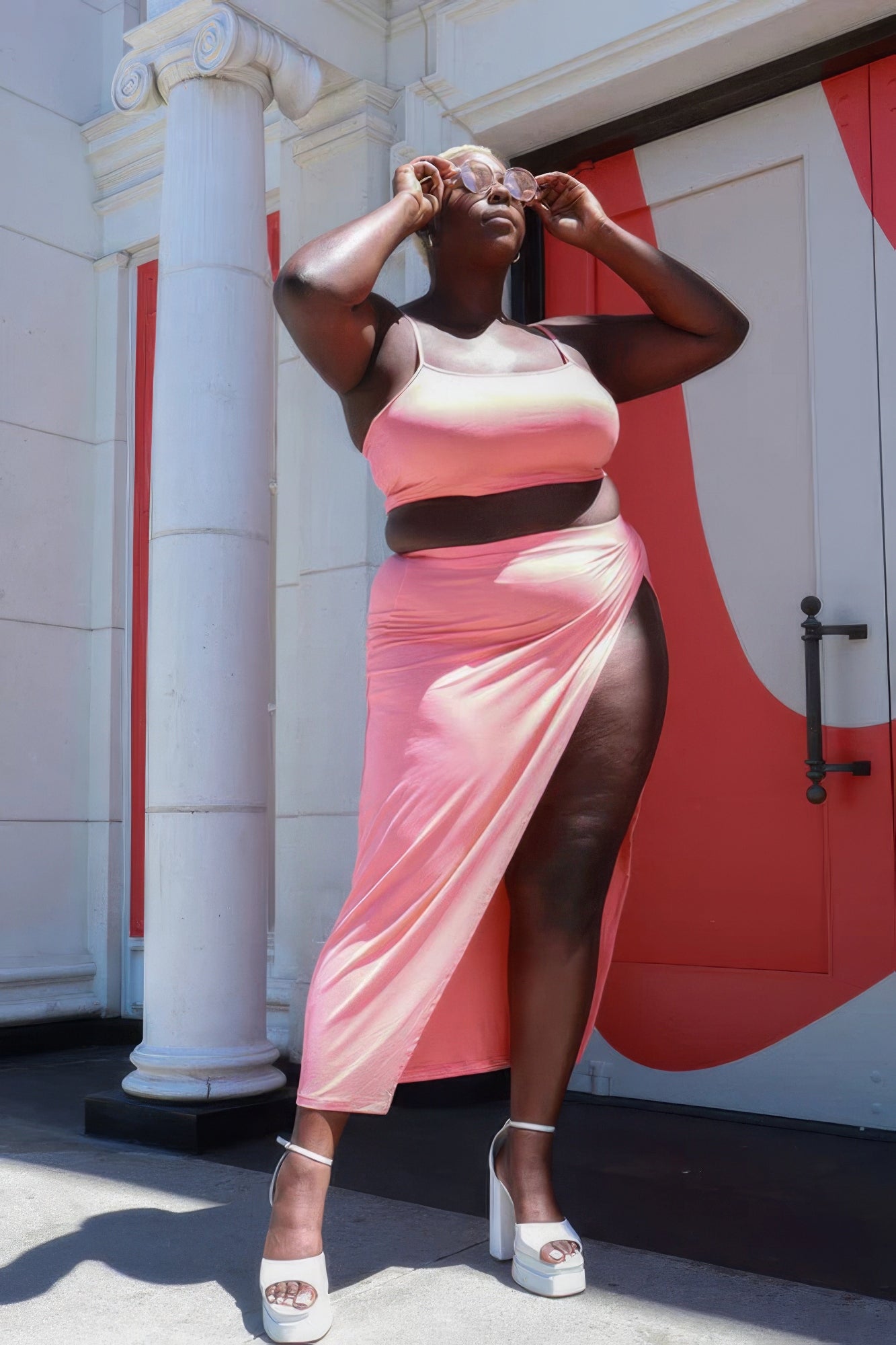 Plus Size Crop Cami & Split Thigh Maxi Skirt Set in pink, showcasing stylish design and comfort outdoors.