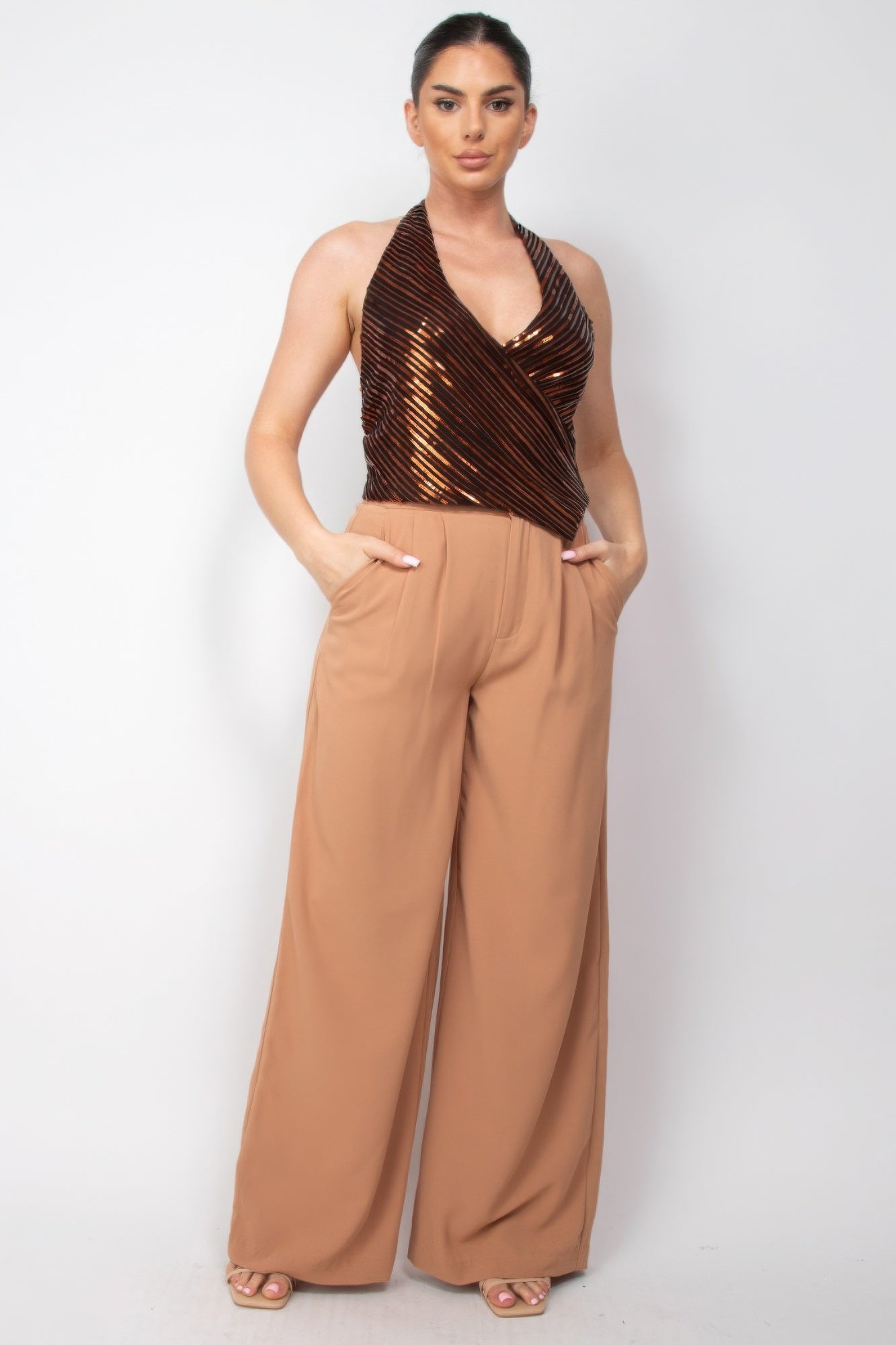 Elevate your style with the Surplice Halter Sequin Top by Love It Clothing, perfect for dazzling evening events.