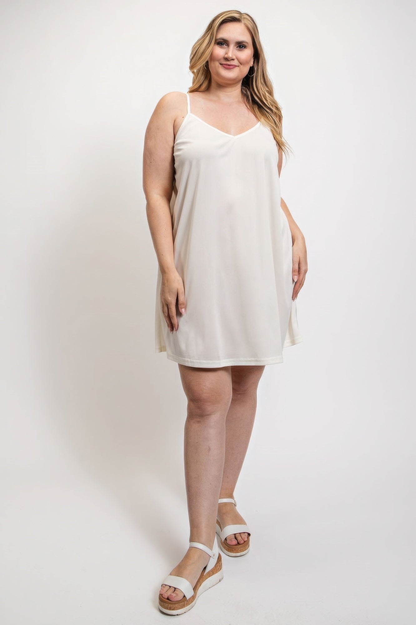 V-neck slip dress with adjustable straps in white, featuring a flattering fit from Loveitclothing.com