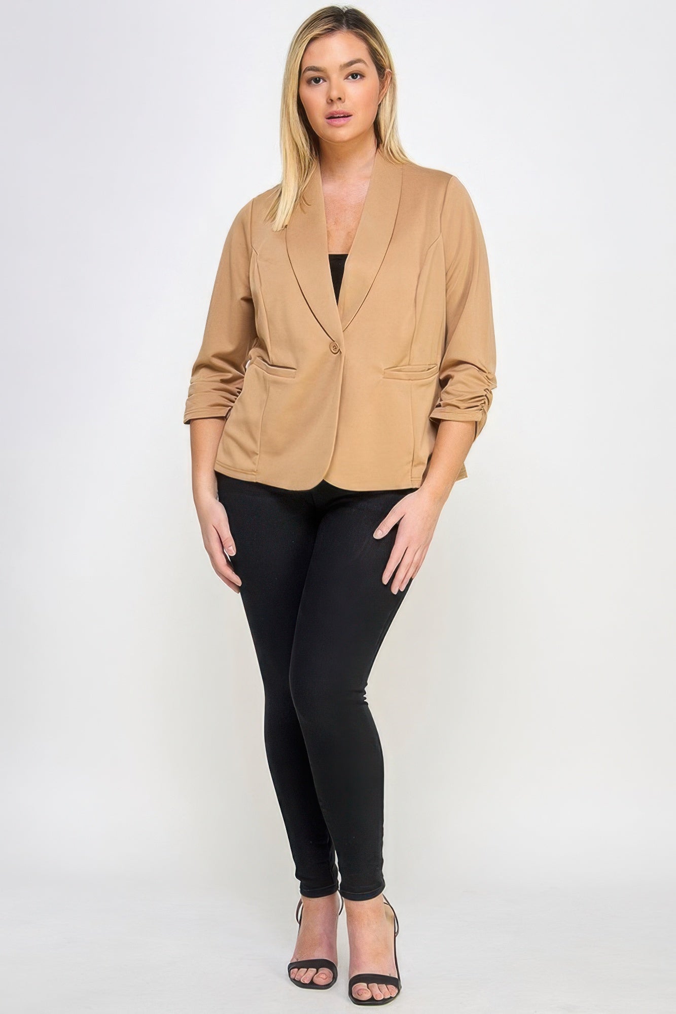 Woman wearing Techno Scuba Blazer with pockets from Loveitclothing.com, showcasing style and comfort in a professional outfit.