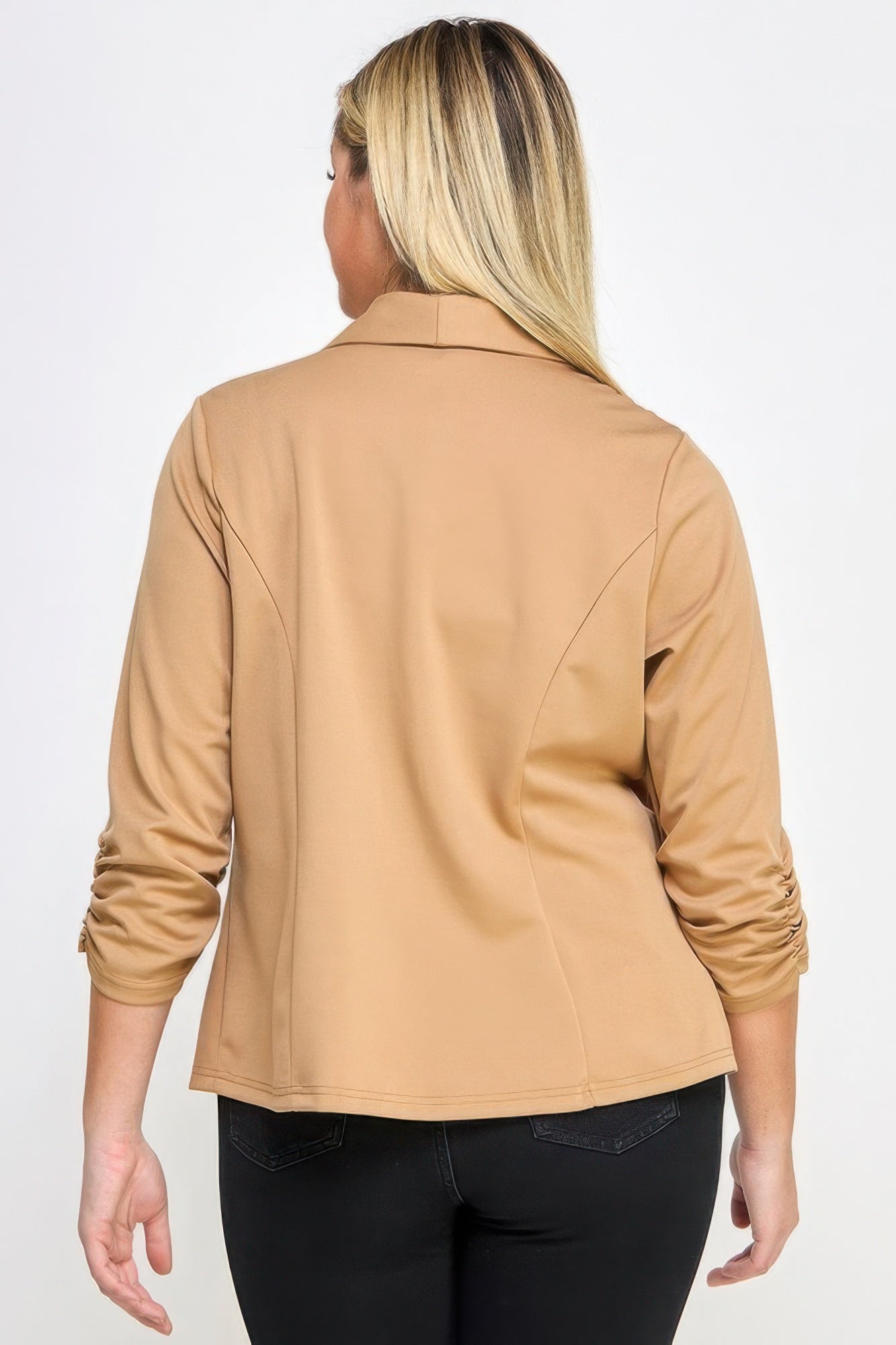 Woman wearing Techno Scuba Blazer with Pockets in camel color, showcasing back view. Available at Loveitclothing.com.