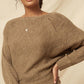 A Ribbed Knit Sweater