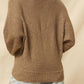 A Ribbed Knit Sweater