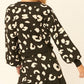 A Leopard Print Pullover Sweater