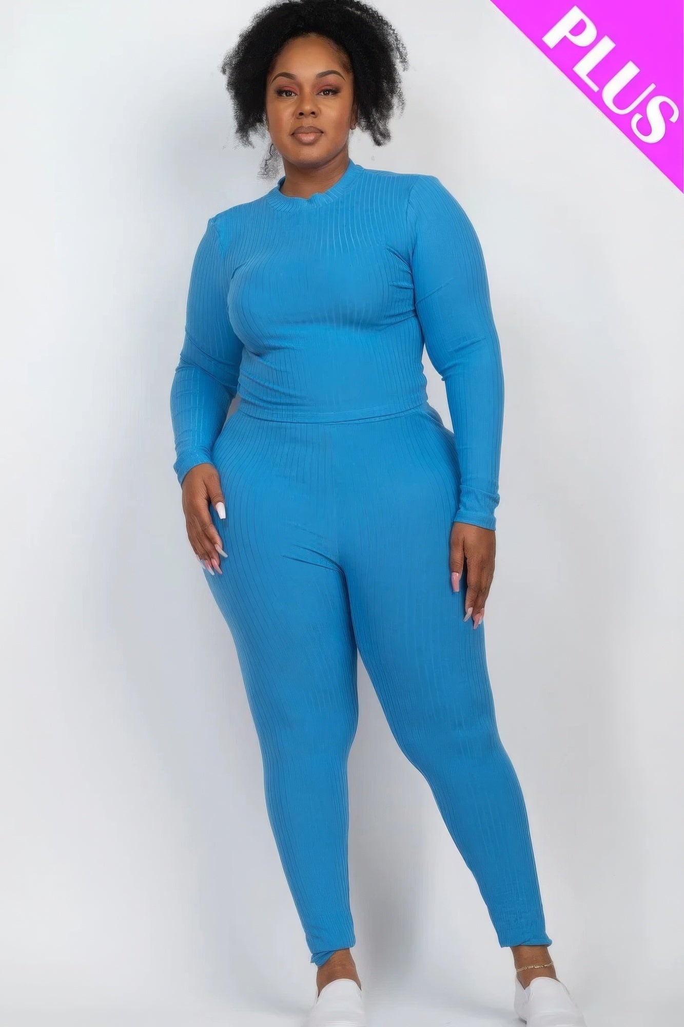 Plus size blue ribbed mock neck long sleeve top and leggings set, featuring a comfortable high-stretch knit for a stylish look.