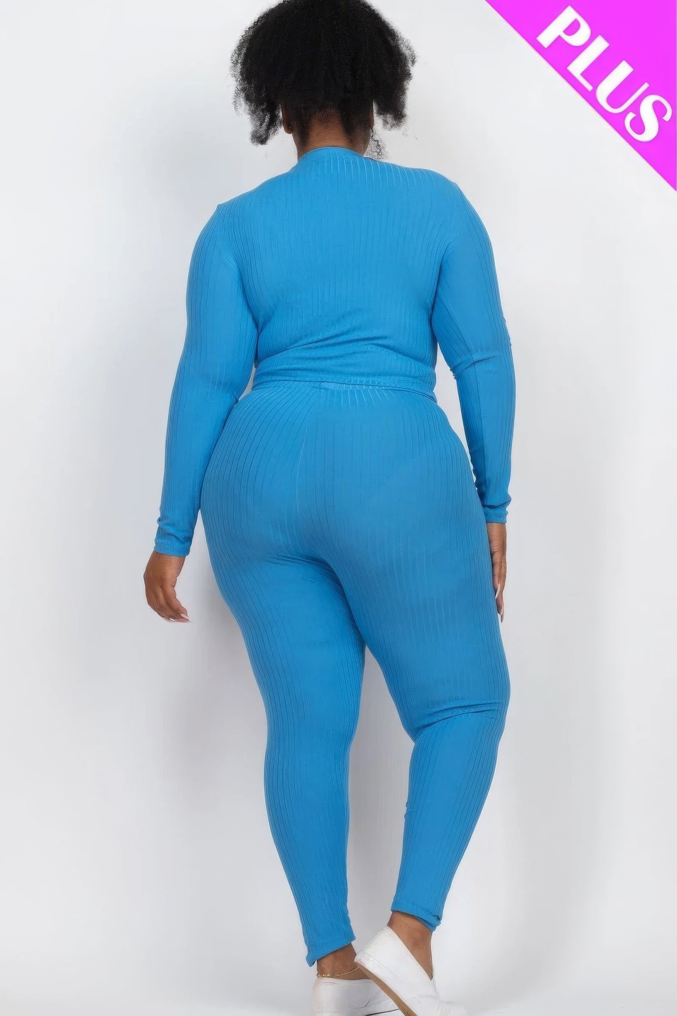 Plus size blue ribbed mock neck long sleeve top and leggings set from the back view.