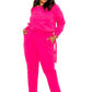 Woman wearing a pink Grommet Detail Lounge Set with pockets, showcasing plus-size fashion in a stylish and comfortable design.