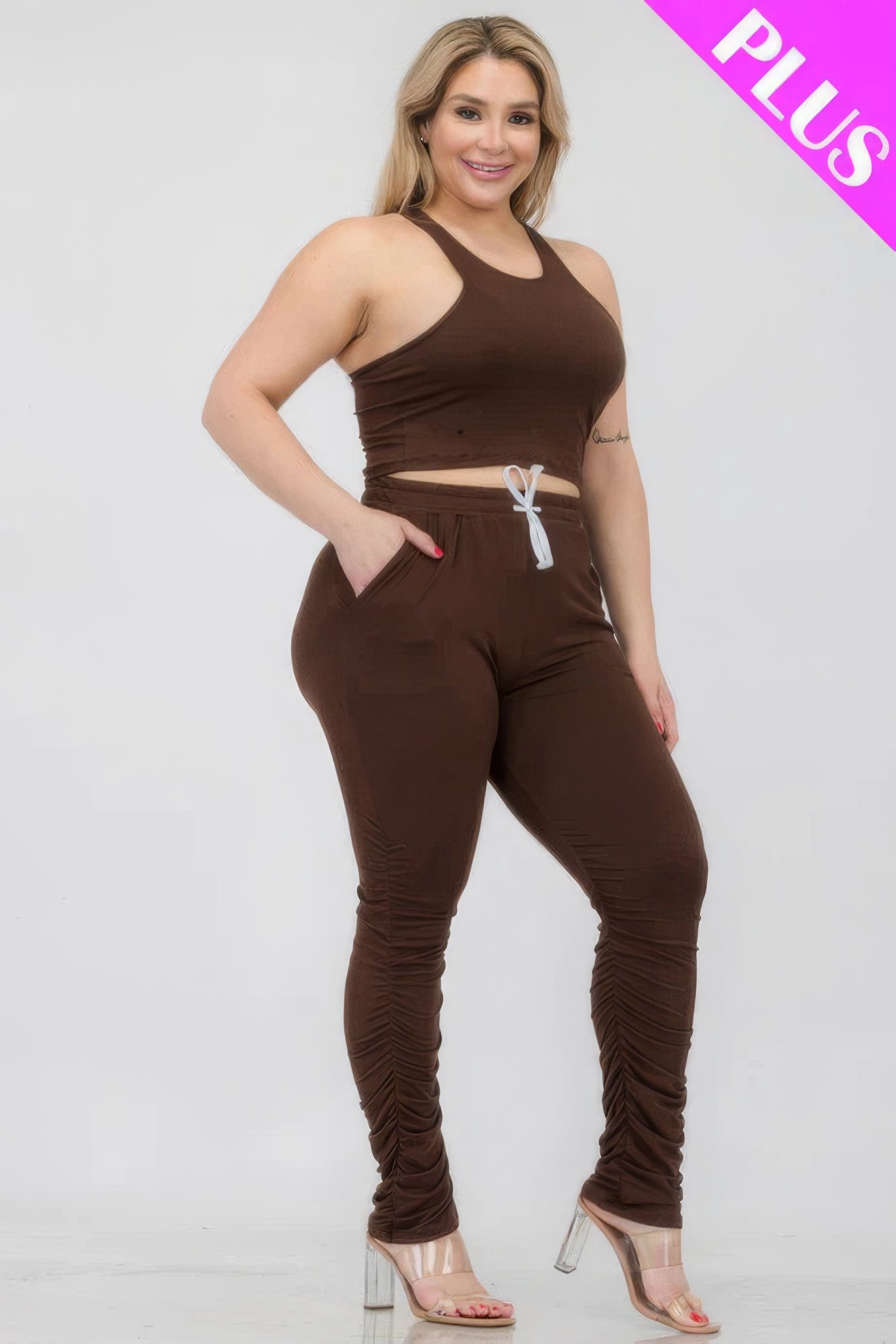 Plus size crop tank top and ruched pants set in brown, featuring a comfortable fit with durable polyester and spandex blend.