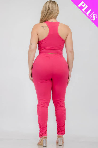 Plus size crop tank top and ruched pants set in pink, stretchy fit, back view.