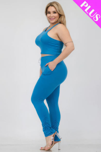 Plus size blue crop tank top and ruched pants set, featuring comfort and stretch, perfect for stylish everyday wear.