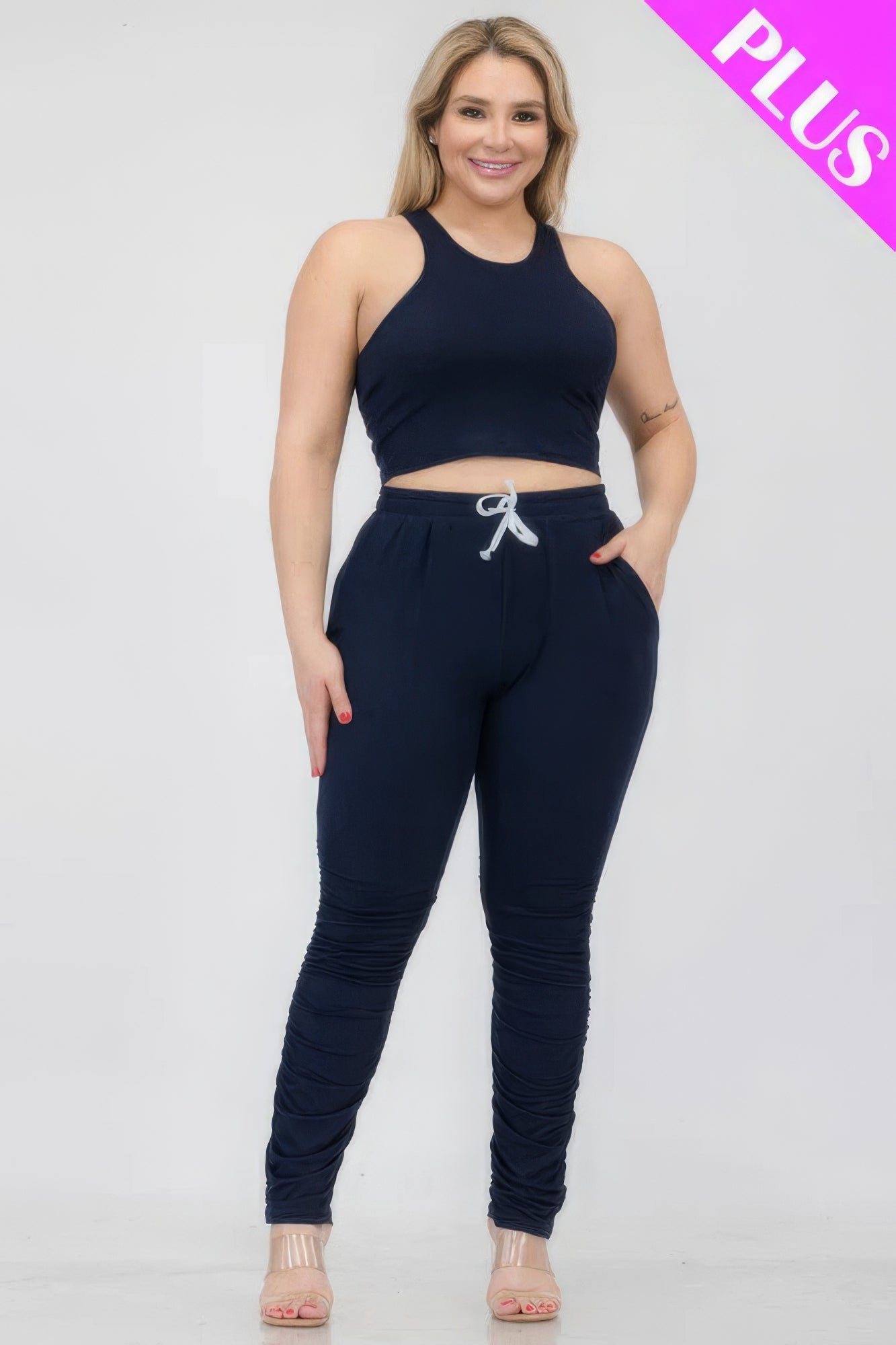 Plus size crop tank top and ruched pants set in navy, showcasing stretchy and comfortable fit