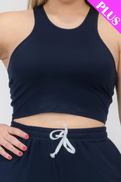 Plus size navy crop tank top and ruched pants set with drawstring waist detail.