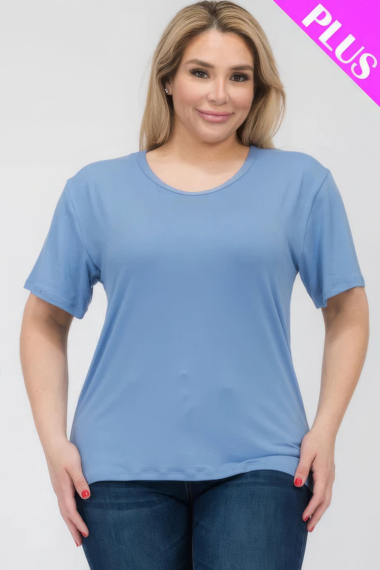 Plus size woman wearing a soft blue basic short sleeve t-shirt, showcasing relaxed fit and comfort from Loveitclothing.com.