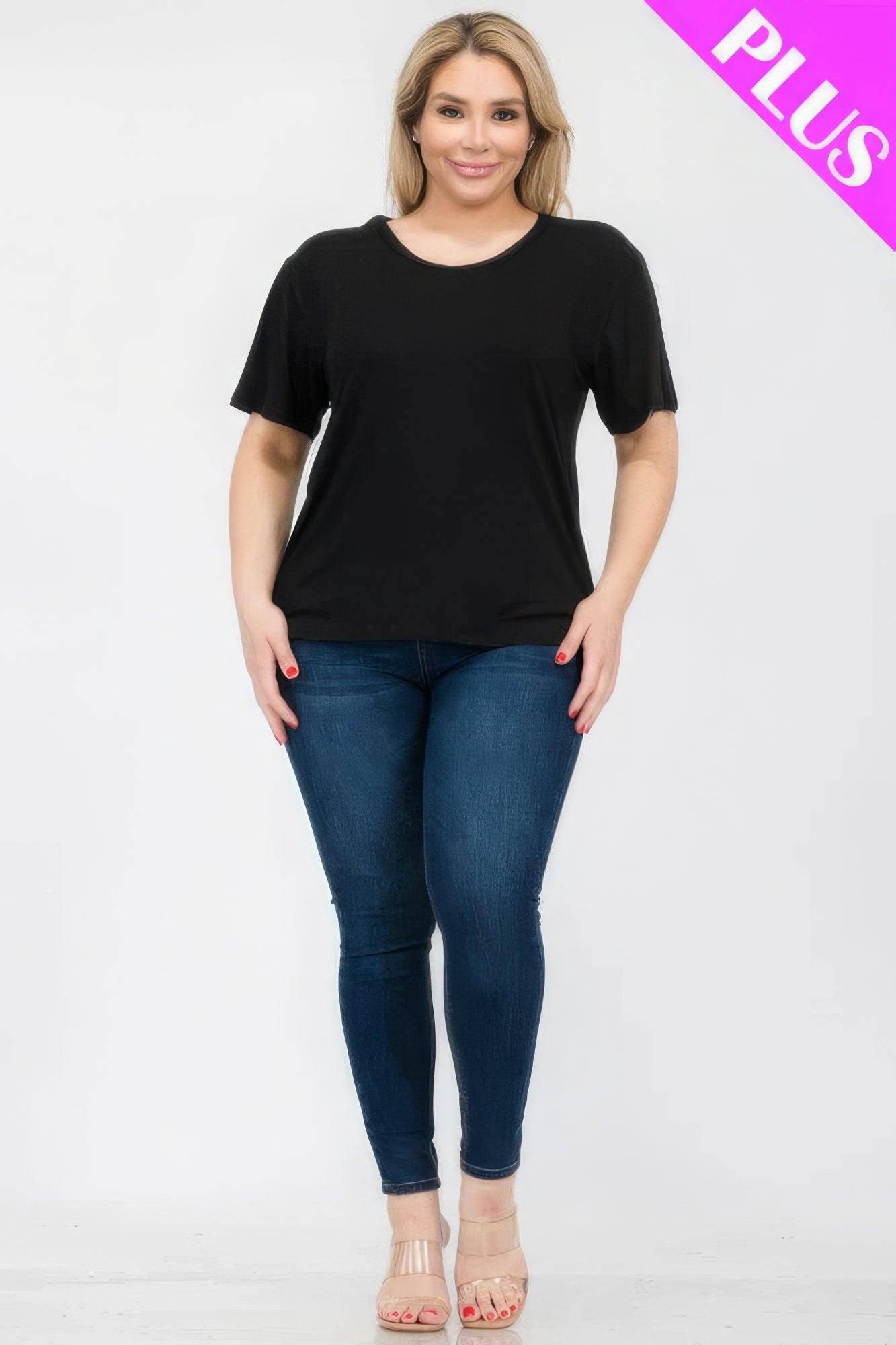 Plus size basic short sleeve t-shirt in black, worn with denim jeans, perfect for stylish comfort at Loveitclothing.com.