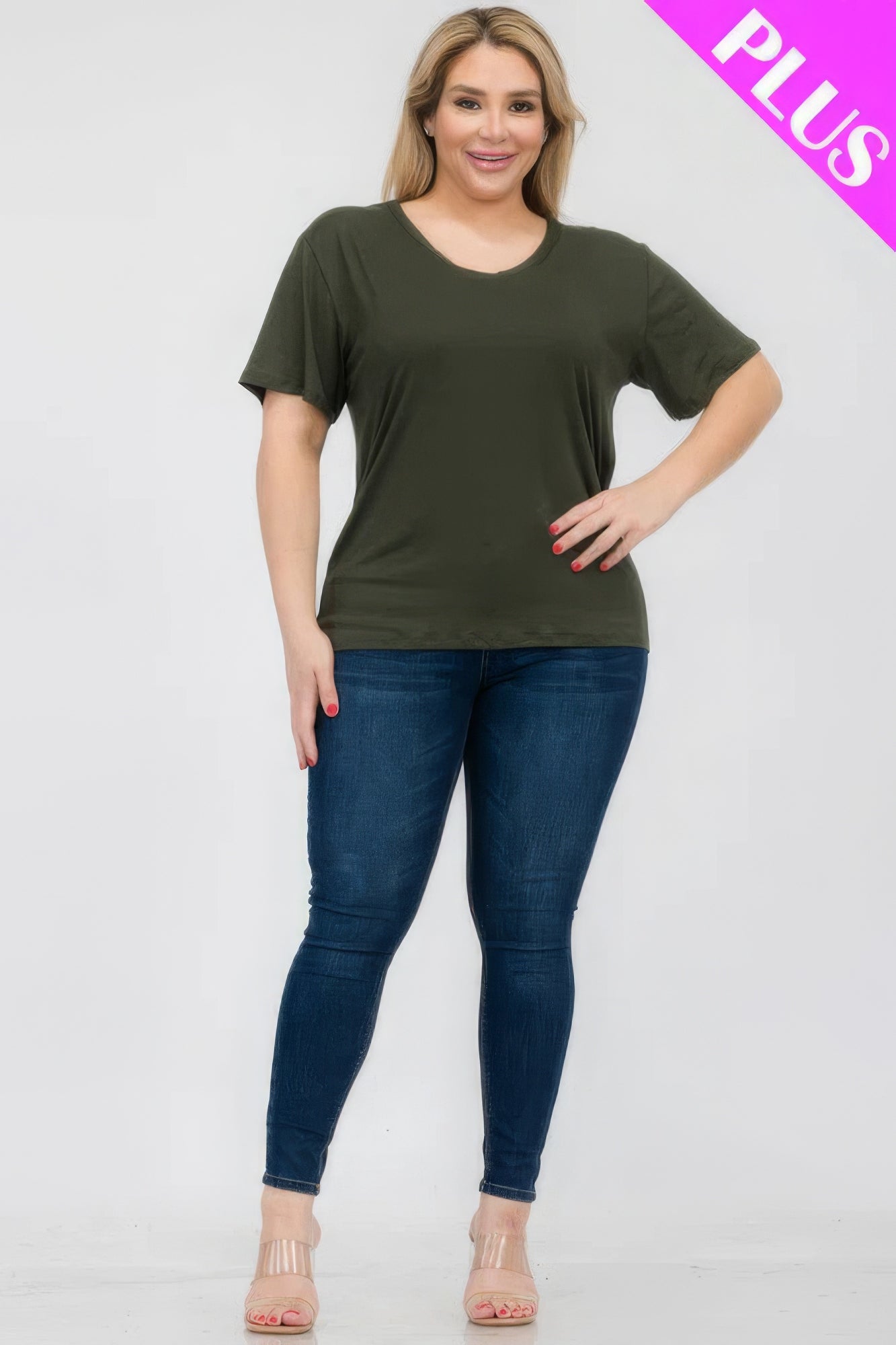 Plus size short sleeve T-shirt in olive green paired with skinny jeans, perfect for casual style at Loveitclothing.com.