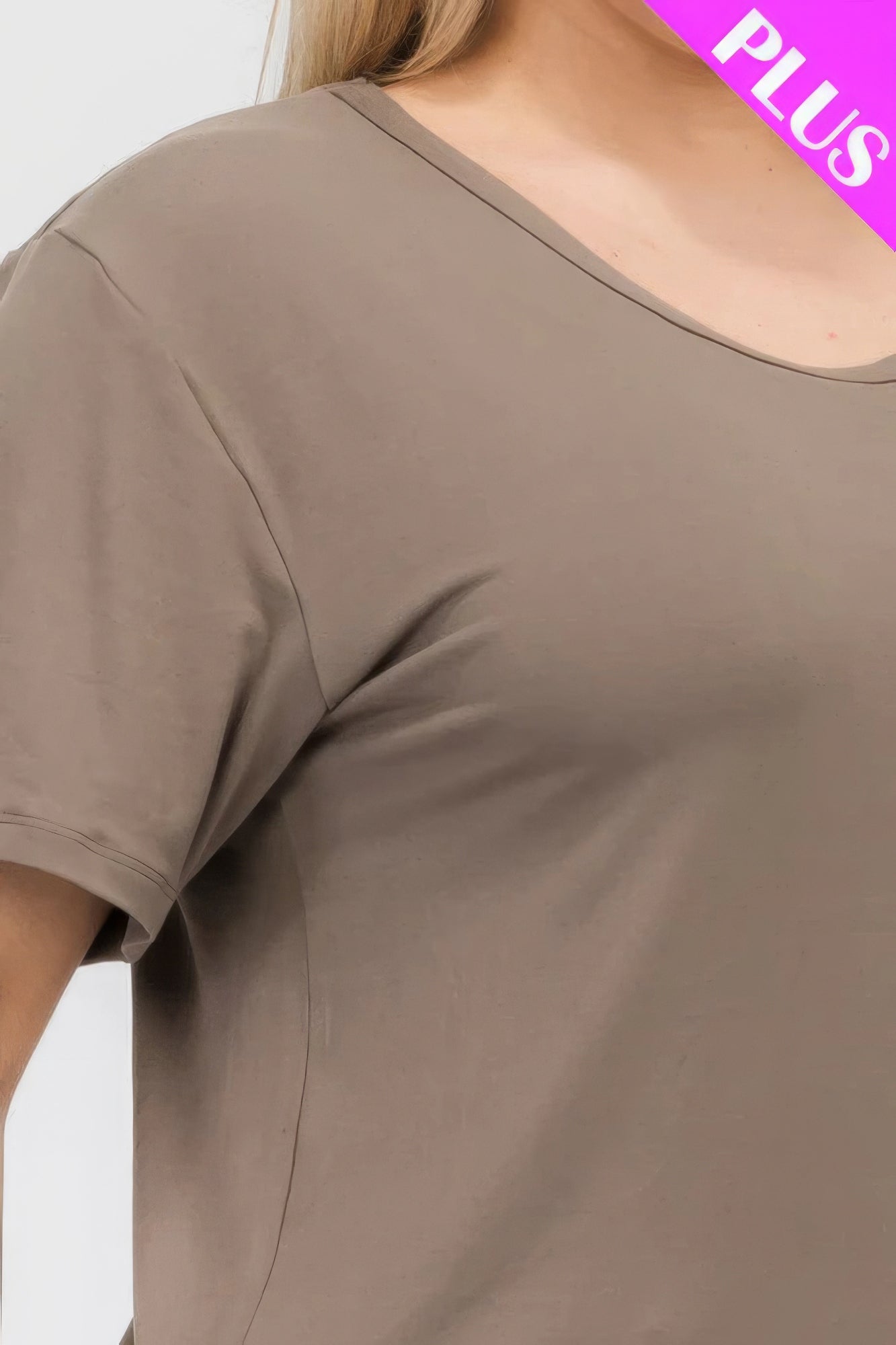 Close-up of a plus-size short sleeve T-shirt in soft, stretchy fabric from Loveitclothing.com.