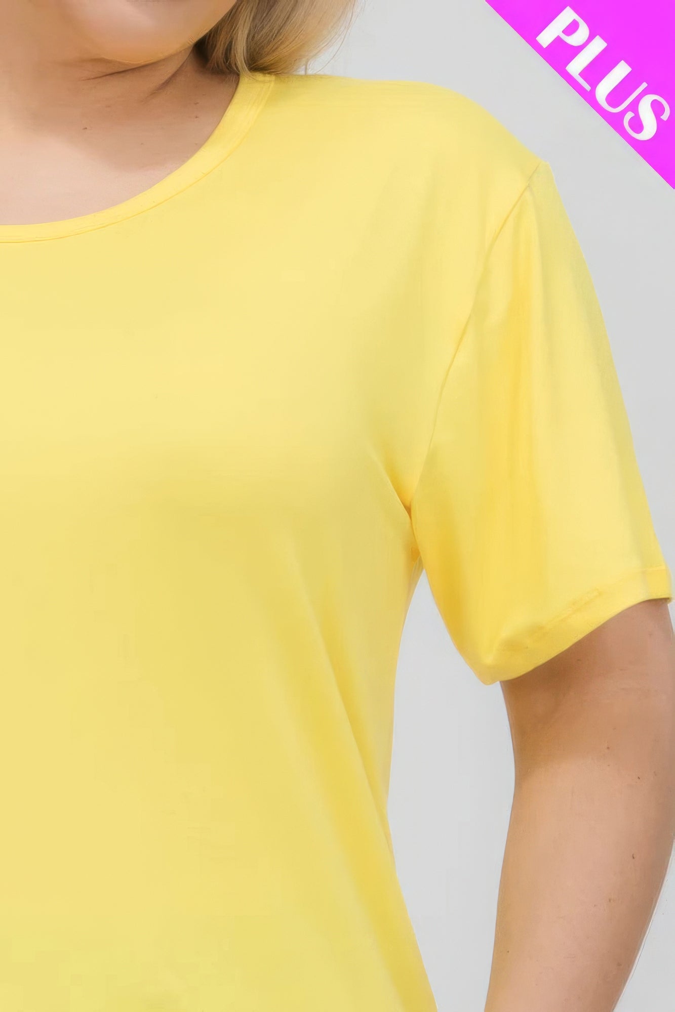 Plus size basic short sleeve t-shirt in vibrant yellow, showcasing soft fabric and relaxed fit from Loveitclothing.com.