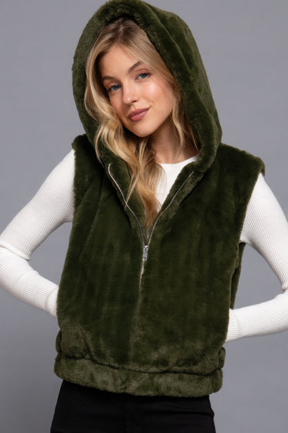 Woman wearing green Hoodie Faux Fur Vest by Love It Clothing with relaxed fit and hoodie design. Perfect for layering and adding warmth.