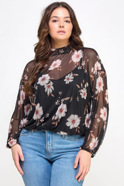 Woman wearing Loveitclothing.com Mesh Floral Long Sleeve Top with Cami, showcasing timeless style and comfort.