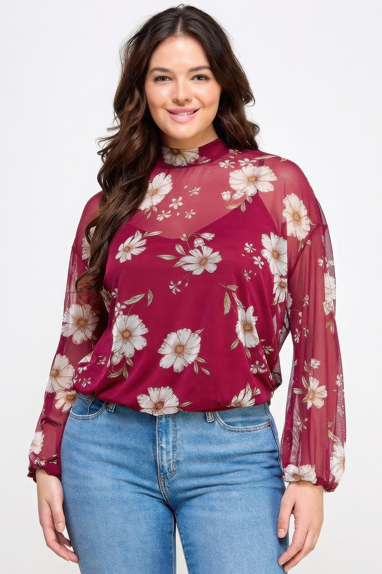 Woman wearing Mesh Floral Long Sleeve Top with Cami from Loveitclothing.com, showcasing style and comfort in a floral design.