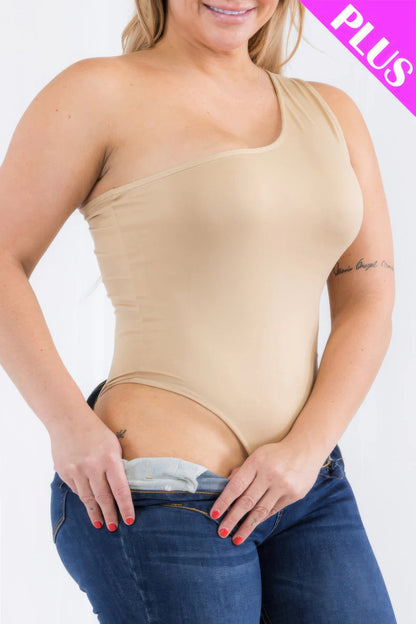 Plus size one shoulder casual bodysuit in beige, showcasing a sleek design paired with denim jeans. Loveitclothing.com.