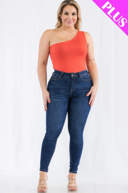 Plus size model in orange one-shoulder bodysuit paired with dark jeans, showcasing stylish and comfortable fashion at Loveitclothing.com.